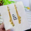 Aretes Largos con Borla y Corazón Grabado con Láser en Oro Arena Joyería de Moda Imitación Oro Simple Joyería de Moda Venta al por Mayor de Aretes