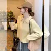 Cárdigan de punto Kaning estilo francés color amarillo ganso con cuello polo para mujer 2026 Nuevo diseño de principios de otoño Suéter con doble cremallera para mujer