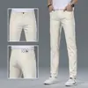 Jeans Branco de Alta Qualidade para Homens Hong Kong Outono 2026, Corte Slim, Perna Afunilada, Business, Elástico, Versátil, Calça Branca Pura Casual