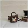 Bolsa de Mão Balde com Renda de Bolinhas Japonesa Fofa e Romântica 2026 Nova Bolsa de Ombro Transversal Estilosa em PU