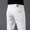 Jeans negros ajustados estilo Hong Kong para hombre, moda coreana otoño/invierno, forrados de polar, elásticos, versátiles pantalones largos casuales