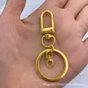 Juego de Tres Piezas de Hebilla de Puerta Negra Mate, Hebilla de Puerta Dorada Más Gancho Giratorio Dorado Claro en Forma de Ocho con Anillo Plano Accesorios de Llave Transfronterizos