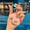 Llavero con incrustaciones de diamantes en stock, colgante de bolso de caballito "Get Rich Quick" de piel sintética, columpio creativo y versátil al por mayor
