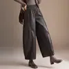 Pantalones Curvos de Pierna de Cuero PU Chic de Moda para Mujer Otoño 2026 Nuevos Pantalones Cropped Sueltos con Cintura Ceñida Adelgazantes Versátiles Casuales