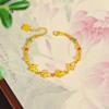 Tienda de oro Jin Yan con el mismo estilo flor de oro arenoso mariposa destello flor de coche pulsera de cuentas joyería de nicho de lujo ligero versátil para novia