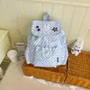 Mochila con cordón versátil estilo coreano 2026 con lunares y estrellas para niñas, sensación de alta gama, mochila pequeña de viaje para mujeres