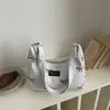 Bolso de hombro de alta gama, nuevo y elegante bolso de lona de mezclilla para mujer, bolso tote dulce y versátil con lazo, estilo casual