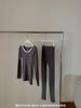 Traje de lana de oveja de otoño e invierno de la sociedad coreana, sensación ligera, fiebre, levantamiento de cadera, barriga, sin costuras, ropa interior térmica agradable para la piel, ropa y pantalones de otoño para mujer