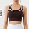 Sujetador deportivo de bloques de color, con copas fijas y espalda cruzada, de alta elasticidad, diseñado para mujeres jóvenes, adecuado para correr, fitness y secado rápido, se puede usar como capa exterior