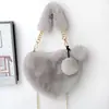 Bolso de mano transfronterizo con forma de corazón de felpa, bolso de hombro y bandolera para mujer, bolso de cadena de piel sintética de conejo, bolso lindo con forma de corazón, modelo nuevo