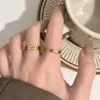 Anillo Minimalista de Acero de Titanio con Espiga de Trigo Dorada para Mujer, Nicho de Lujo Ligero con Sensación de Alta Gama, Anillo para Dedo Índice que No se Desvanece