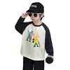Elegante camiseta de manga larga para niños, colección de otoño 2026, nuevo diseño con mangas raglán, top versátil como capa base para bebés