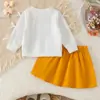 Ropa de primavera y otoño para niña de 26 años, sudadera de color liso con lazo y falda corta plisada, conjunto de bebé elegante y a la moda directamente de la fábrica fuente