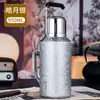 Nuevo termo vintage de alta gama con recubrimiento de titanio para la salud de hombres y mujeres, con alto valor estético, exquisito compartimento independiente para té, taza de titanio para uso doméstico