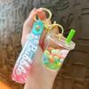 Llavero Creativo de Taza de Té con Leche de Gominola Exquisito y Lindo Colgante Pequeño de Arena Movediza Líquida Accesorios para Bolsos Pequeño Regalo Suministro
