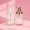 Venta al por mayor de fábrica Botella de champú de 450 ml Botella dispensadora dorada electrochapada Botella de plástico PET Botella de champú de aminoácidos