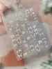Pegatinas para Uñas de Hormiga Estampado en Caliente Árbol de Navidad Lazo Pegatinas Estilo Navideño Decoraciones para Uñas Fabricante Original YT9370