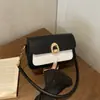Bolso de axila de diseño vintage de nicho, nuevo y moderno bolso de sillín de moda, bolso de hombro simple, casual y versátil