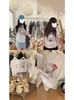 2026 Nuevo Estilo Japonés Lindo Dulce Estampado de Gato KT Camiseta de Manga Corta para Mujer Verano Holgada Versátil Cuello Redondo Top Moderno