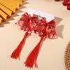 Horquilla de lazo rojo con bola de pelo estilo chino borla horquilla para niños Año Nuevo Hanfu clip para bebé diadema de cinta