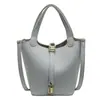 Bolso Cubo con Patrón de Lichi para Mujer 2026 Nuevo Estilo Bolso Cruzado de Hombro Casual Simple Calidad de Alta Gama Bolso Madre-Hija