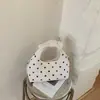 Bolso de Diseño de Nicho 2026 Nuevo Bolso Cruzado de Lunares Retro Bolso de Albóndiga Simple Casual Bolso de Hombro para Viajar