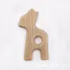 Suministro directo de fábrica palo para morder dientes de bebé Madera de haya diente calmar forma de animal palo para morder dientes morder música