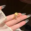 Anillo de gato lindo y femenino estilo coreano para mujer, incrustado con circonita y piedra ojo de gato, ajustable, joya versátil y de moda