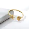 Anel de Design Criativo Estilo Resort Francês Transfronteiriço para Mulheres Banhado a Ouro Estrela do Mar Concha Incrustado com Zircônia Anel de Cauda Ajustável