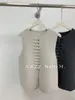 Colete Cardigan Botões Estilo Primavera e Outono 2026 / Novo Estilo Chinês para Mulheres, Caimento Solto, Para Usar em Camadas, Cor Sólida, Básico Versátil