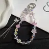 Nueva cadena para teléfono de borla de mariposa con cuentas en forma de estrella, ligera, lujosa y delicada, perfecta para bolsos de niñas y como llavero