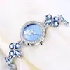 Comercio Exterior AliExpress Venta Caliente Moda Estudiante Pulsera Reloj Cuatro Hojas Trébol Diamante Reloj de Cuarzo Aleación Lujo Ligero para Mujer