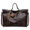Bolsa tote vintage de nicho de alta qualidade para outono e inverno, grande capacidade, novo modelo 2026, bolsa de mão feminina para trabalho e deslocamento