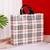 Linda bolsa de tienda de ropa con cara sonriente, bolsa de regalo, tienda de ropa para niños y niñas, bolsa de plástico portátil, embalaje de caja de zapatos, logotipo al por mayor