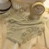 Pantaletas triangulares sin costuras de seda helada para niñas con ribete de encaje, transpirables y cómodas, de cintura media, estilo puro y seductor
