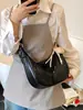 Bolsa de Dumpling Popular de Verano para Mujer 2025 Nueva Versátil Casual Bolso de Hombro Simple Color Puro Bolso Cruzado de Alta Gama