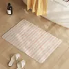 Alfombrilla de suelo de tierra de diatomeas a rayas estilo Ins para uso doméstico, alfombrilla de baño, alfombrilla antideslizante para pies, felpudo de entrada, disponible para venta al por mayor