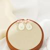 Pendientes de tulipán con forma de corazón, estilo Hepburn, con lazo rosa, perla, románticos y frescos, con espiral antimosquitos y clip para las orejas, sin perforaciones.
