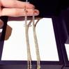 2026 Nuevos Pendientes Largos con Borlas Completamente Incrustados de Diamantes, Estilo Europeo y Americano de Gama Alta, Doble Fila para Mujer, Ganchos de Oreja de Temperamento Exagerado, Venta al por Mayor Transfronteriza