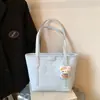 Bolsa Tote Cartoon Embossed de Grande Capacidade para o Dia a Dia Nova Estilosa de Ombro Único Bolsa Saco para Estudante Universitário