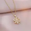 Collar para Mujer Moda Nicho Nuevo Diseño Colgante Celebridad de Internet Flor de Zircón Bauhinia Giratoria Temperamento Collar de Acero Titanio