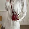 Bolsa Mini Estilo Coreano Nueva Primavera Bolso de Hombro Cruzado de Moda Bolso de Concha Simple y a la Moda