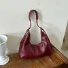 Bolsa de ombro estilosa retrô de grande capacidade para mulheres, uma bolsa tote de alta qualidade adequada para o trajeto diário, versátil e com design texturizado, perfeita como bolsa de antebraço