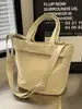 Bolsa Casual Popular Transfronteiriça de Grande Capacidade para Mulheres 2026 Nova Bolsa Leve para o Dia a Dia Bolsa Tote Versátil de Cor Sólida