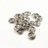 Al por mayor 9.5mm color hebilla de cinco garras hueca metal botón de presión para bebé botón de presión niños ropa de escalada botón de presión