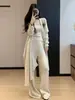 Conjunto de tricô casual estilo francês para mulheres, nova coleção outono e inverno 2026, elegante suéter de cor sólida, calça comprida e regata, conjunto de três peças