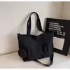 Bolso cruzado transfronterizo de nuevo estilo, color liso simple, gran capacidad, bolso de hombro de nailon, bolso tote minimalista y versátil, bolso de mano de moda