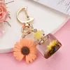 Personalizado lua fivela pequeno crisântemo chaveiro DIY joias acessórios divertido frasco simulação perfume frasco desejo frasco atacado