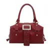 Moda Europea y Americana 2026 Nuevo Bolso de Mano con Remaches de Otoño Moda Femenina Simple Moderno para el Trabajo Bolso de Hombro Único Cruzado