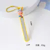 Lindo cortaúñas de dibujos animados en forma de estrella con un limpiador de oídos y lima de uñas, en una paleta de colores cremosos, y diseñado para facilitar su portabilidad